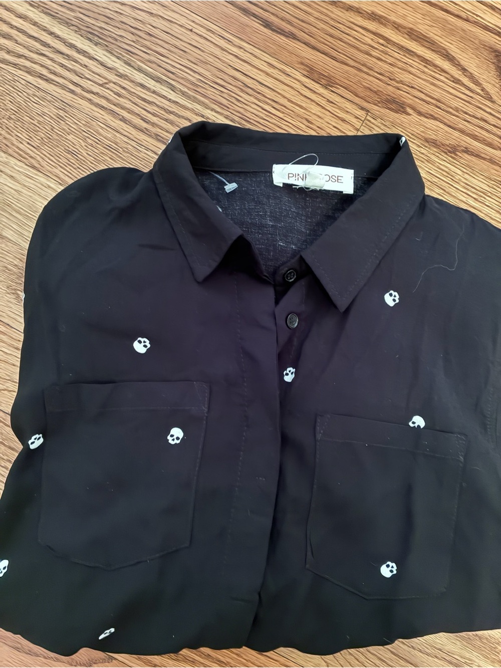 Pink Rose Women's Black Button-Up Shirt with White Skull Print Long Sleeves